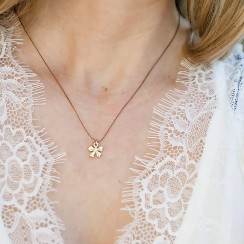 Let Hope Bloom: Gold Flower Charm Necklace